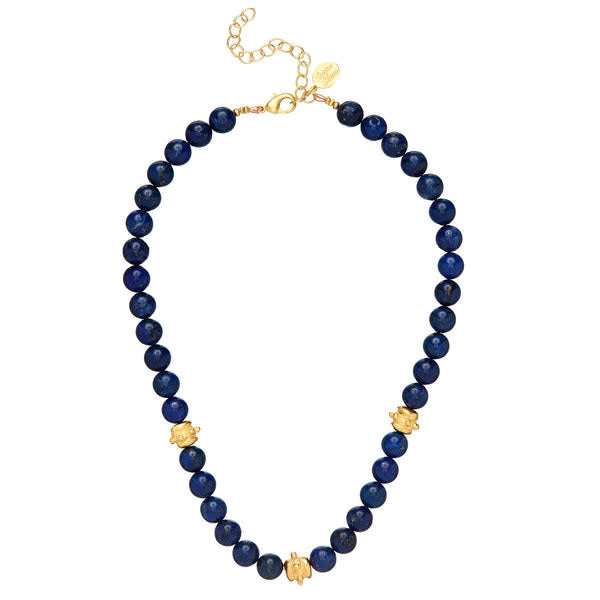 Bailey necklace with gold plating featuring blue lapis lazuli beads on a chain.