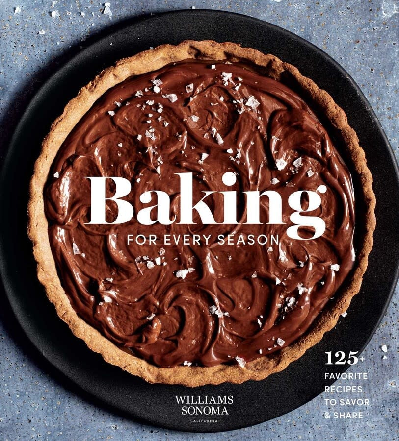 Hardcover cookbook 'Baking for Every Season' with festive holiday-themed cover art.