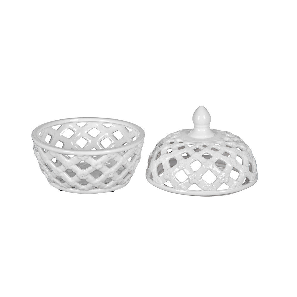 Ceramic lidded jar with delicate lattice pattern featuring tiny flowers at each intersection.