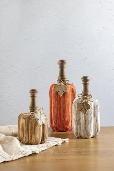 Carved pine wood pumpkin with a baluster stem in natural finish