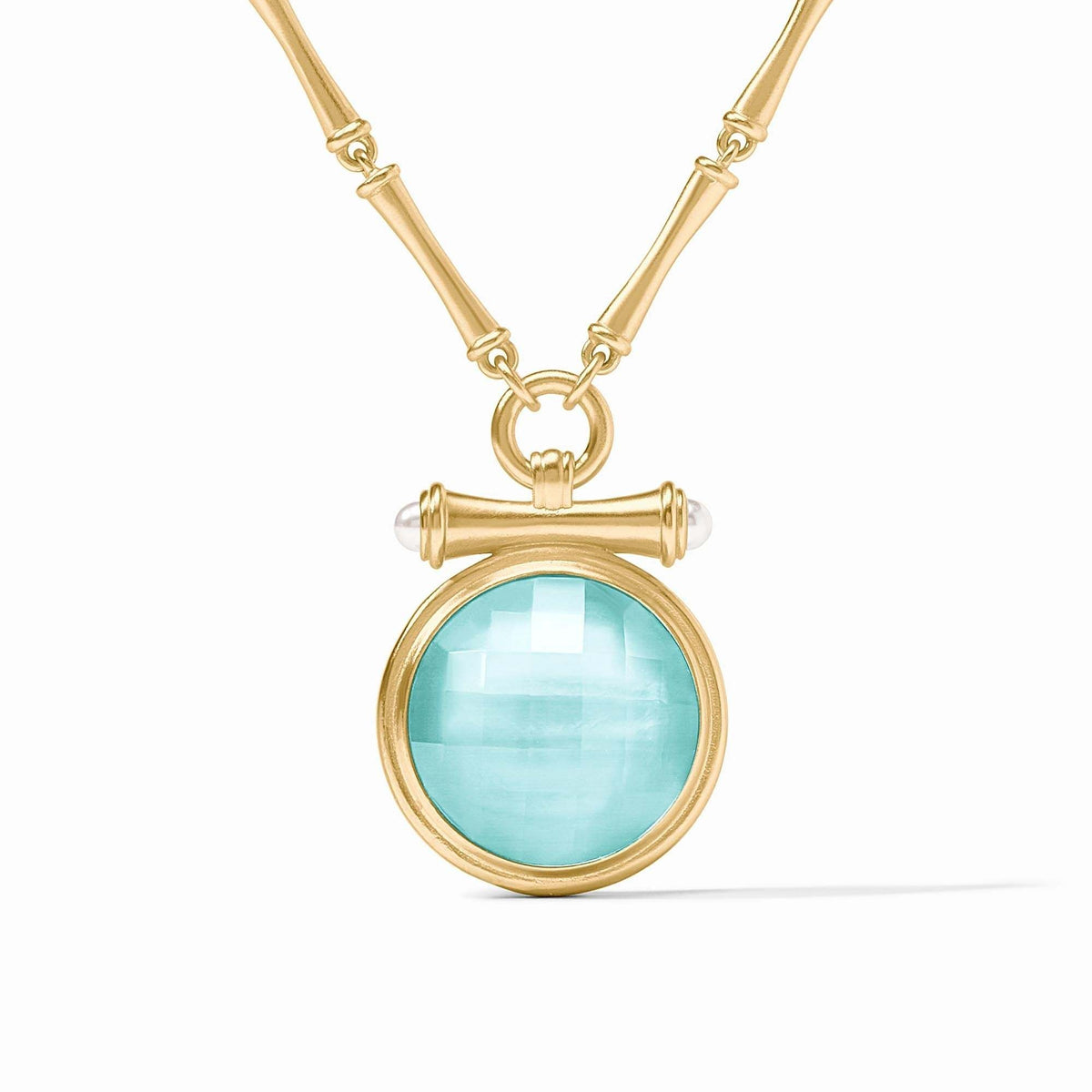 Adjustable bamboo link chain necklace with golden pendant featuring glass pearl cap over round iridescent blue gemstone.