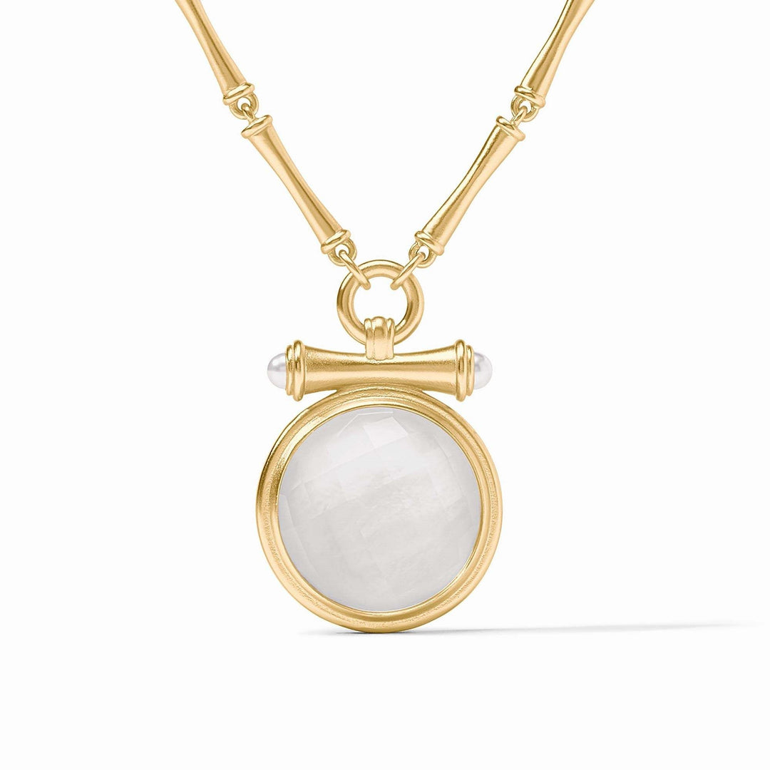 Adjustable bamboo link necklace with golden pendant featuring a pearl cap over an iridescent clear crystal gemstone.