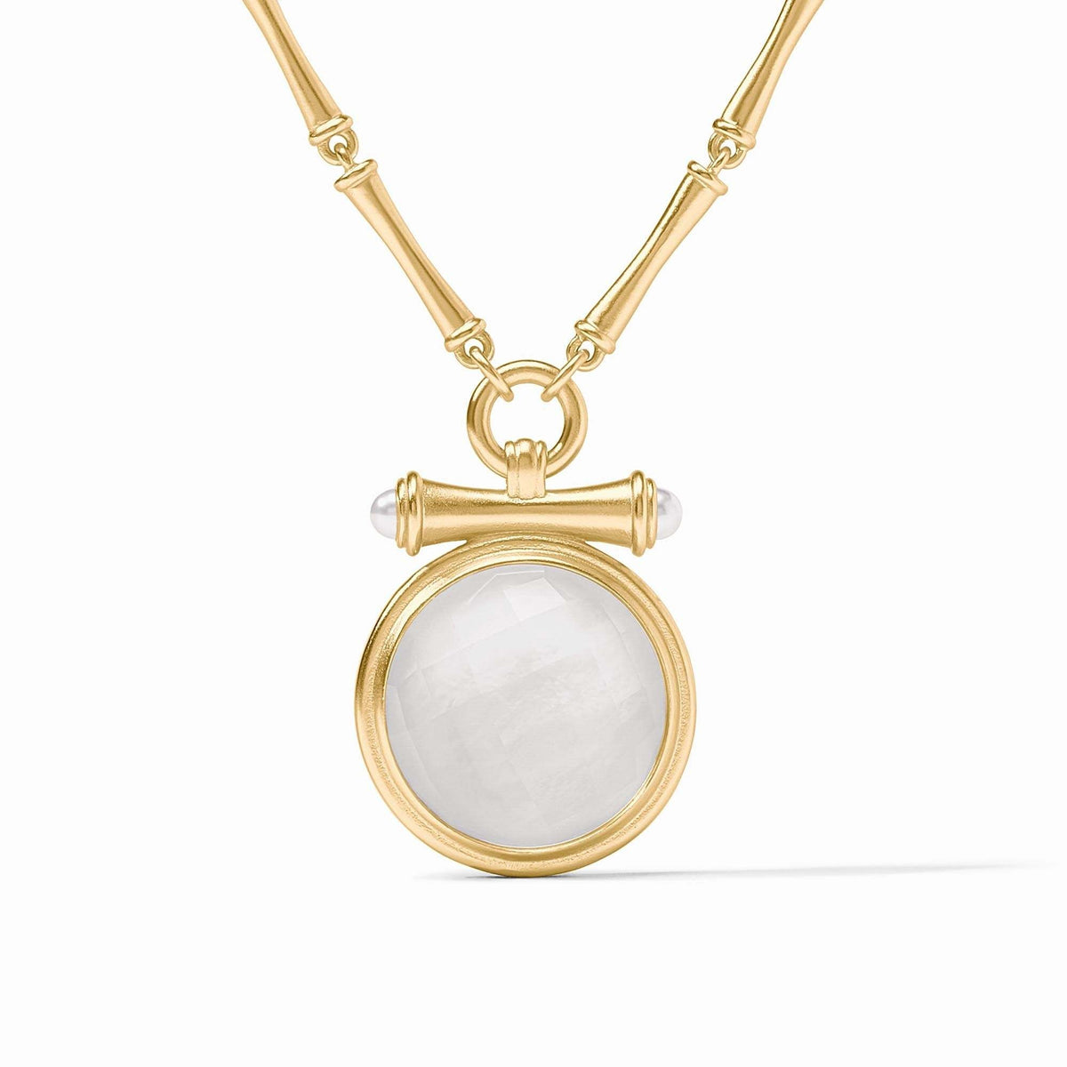 Adjustable bamboo link necklace with golden pendant featuring a pearl cap over an iridescent clear crystal gemstone.