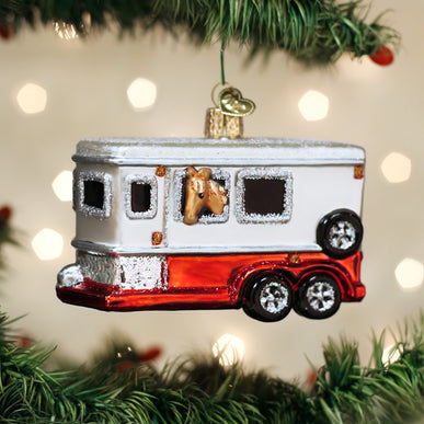 Glass horse trailer Christmas ornament with a white top, red bottom, and a horse in the window.