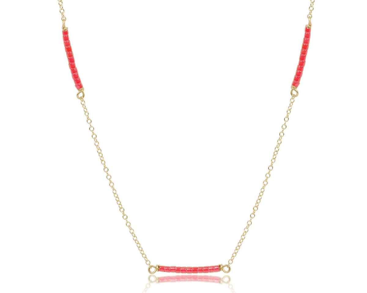 Gold-filled choker necklace with multicolored seed beads on a 15-inch chain.