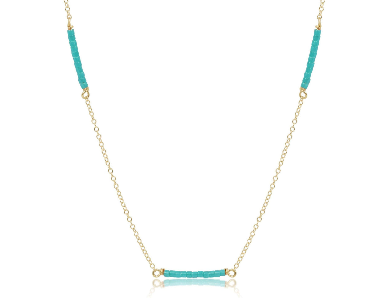 Gold-filled choker necklace with turquoise seed beads on a 15-inch chain.