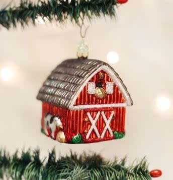 Red barn ornament with white trim featuring painted chickens, a cow, and an old tractor.