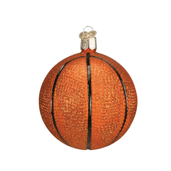 Glass basketball ornament with black lines on a red background