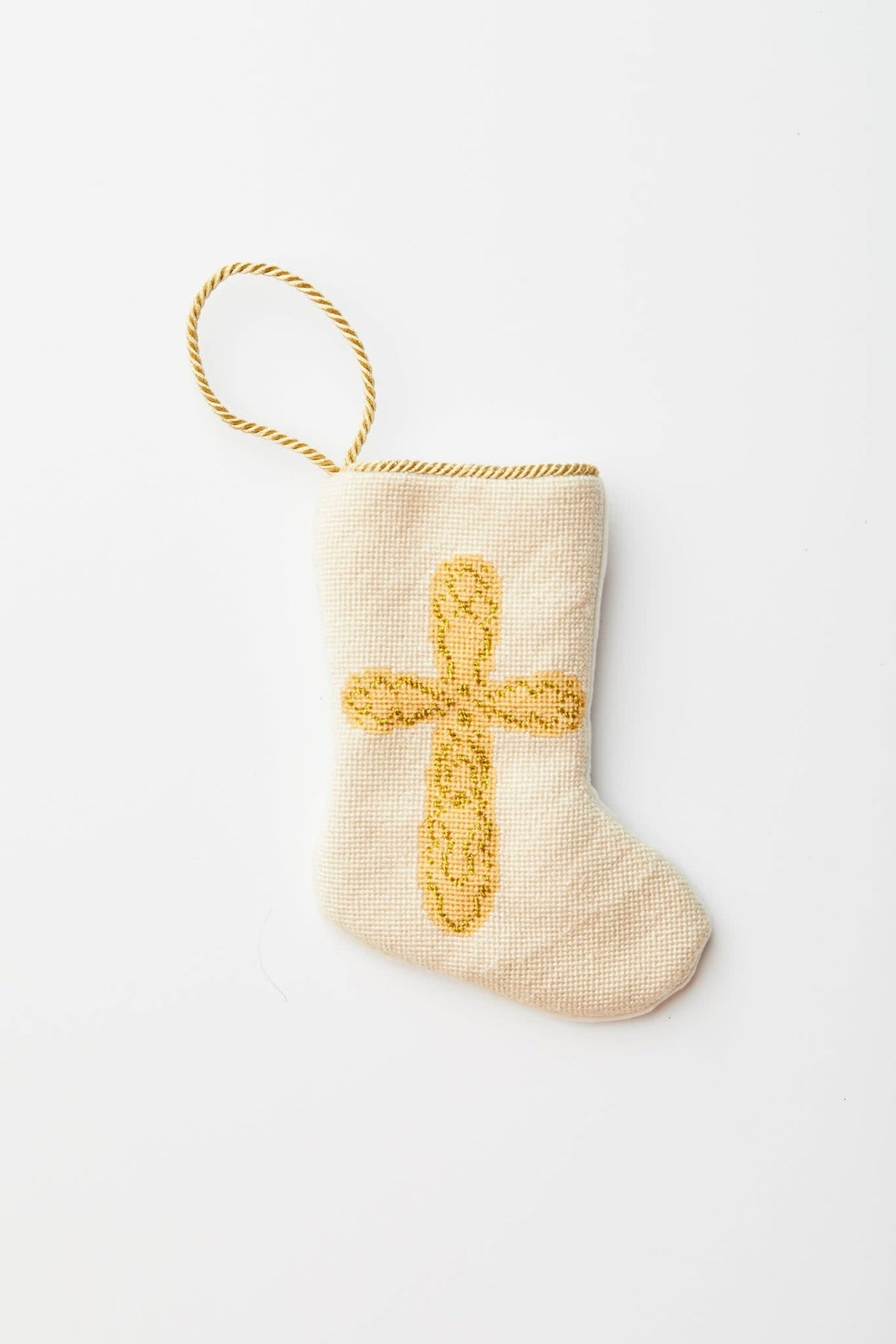 Hand-stitched needlepoint stocking in Prince Of Peace cross design with velvet backing.