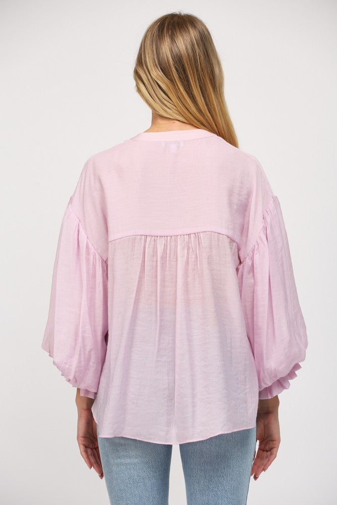 Diana button-down shirt in blue rayon-nylon fabric with puff sleeves.