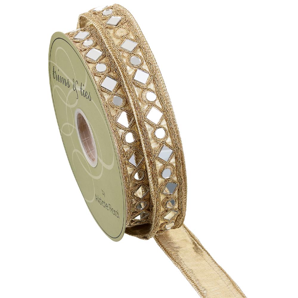 1.5 inch wide gold mirror trim ribbon on a spool with reflective square and round accents.