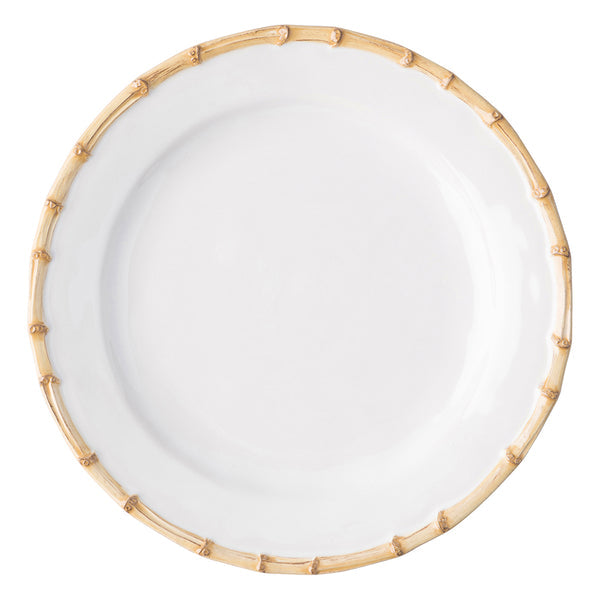 Classic white ceramic charger plate with a natural bamboo-style rim.
