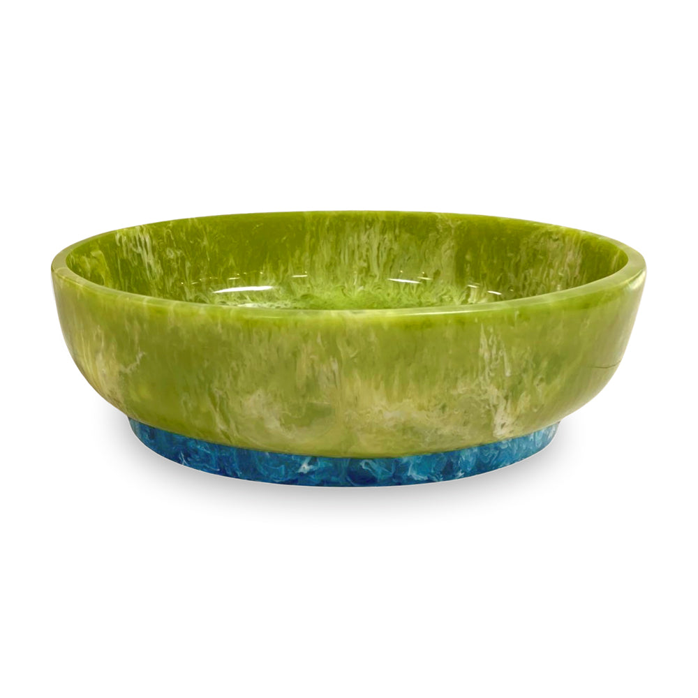 Large oval resin bowl in marbled lime green with a contrasting blue base.
