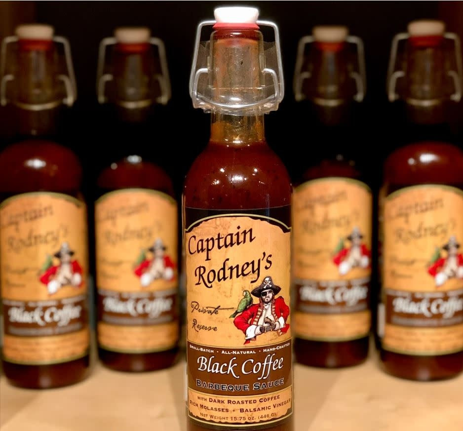 Bottle of Captain Rodney's Black Coffee BBQ Sauce with dark label