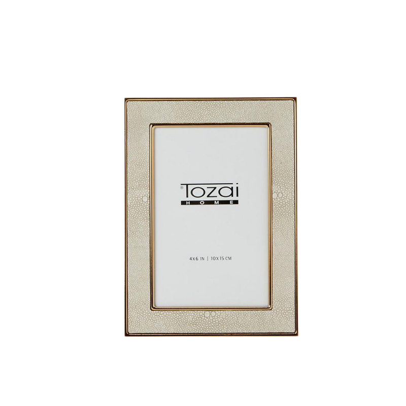 Cream faux shagreen photo frame with gold-tone metal trim and a white insert.