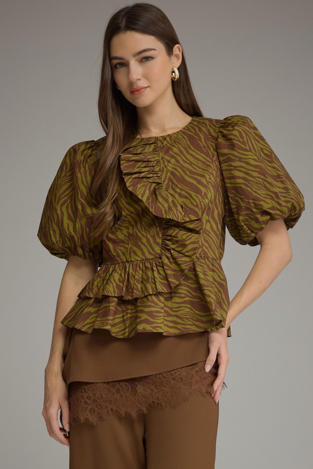 Serena animal print top with short puff sleeves and ruffle details in brown and olive green.