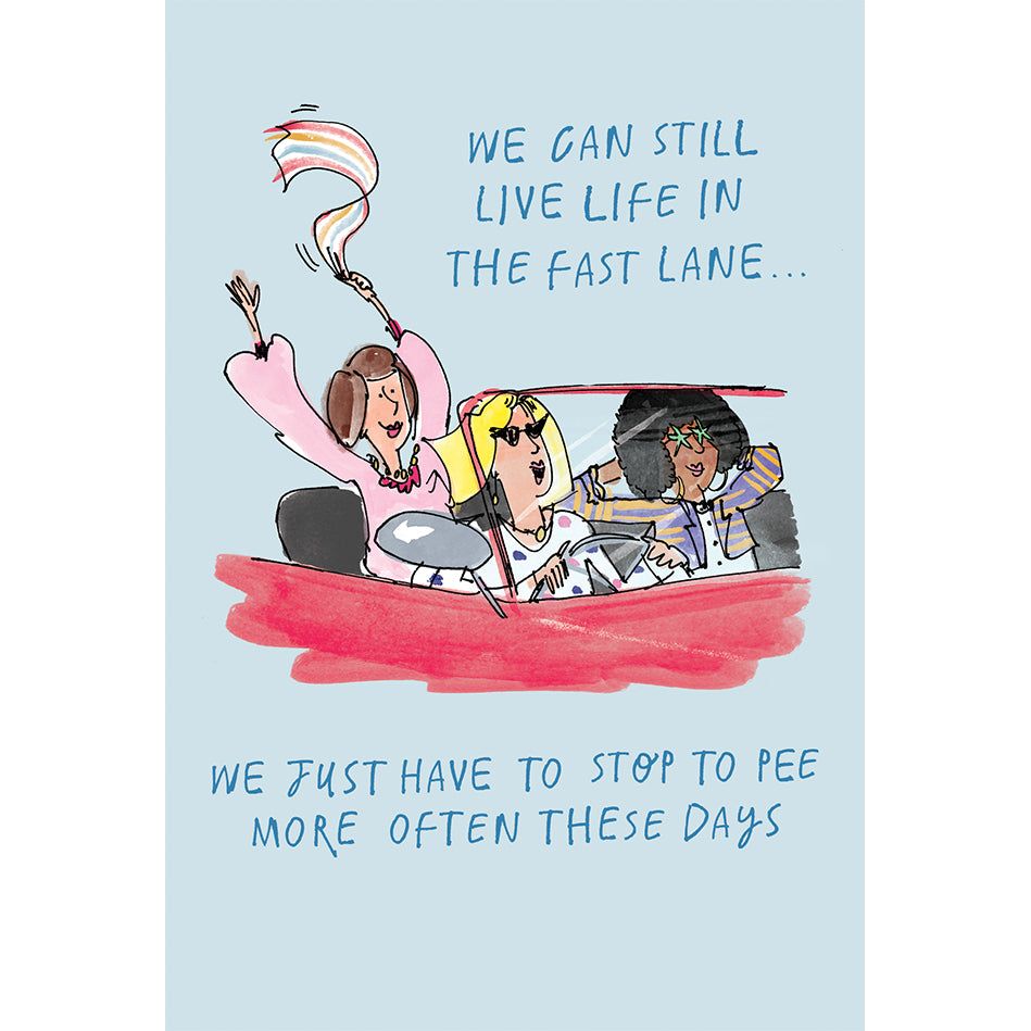 Birthday humor foil balloon shaped like a car with text reading 'We can still live life in the fast lane' and inside message about peeing more often.
