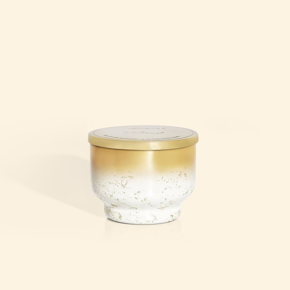 Inverted jar candle in Volcano Glimmer with a textured glass surface.