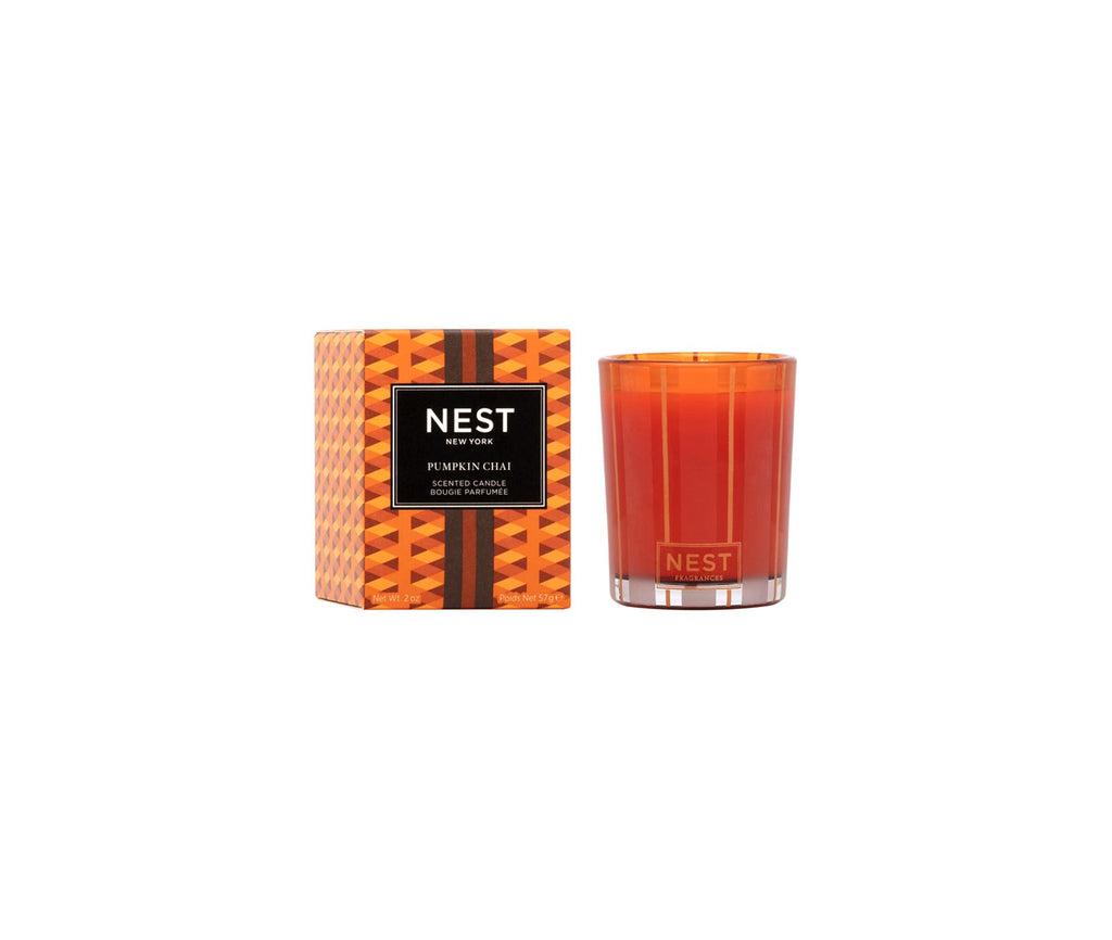 Nest Votive Candle in a clear glass holder with white wax.