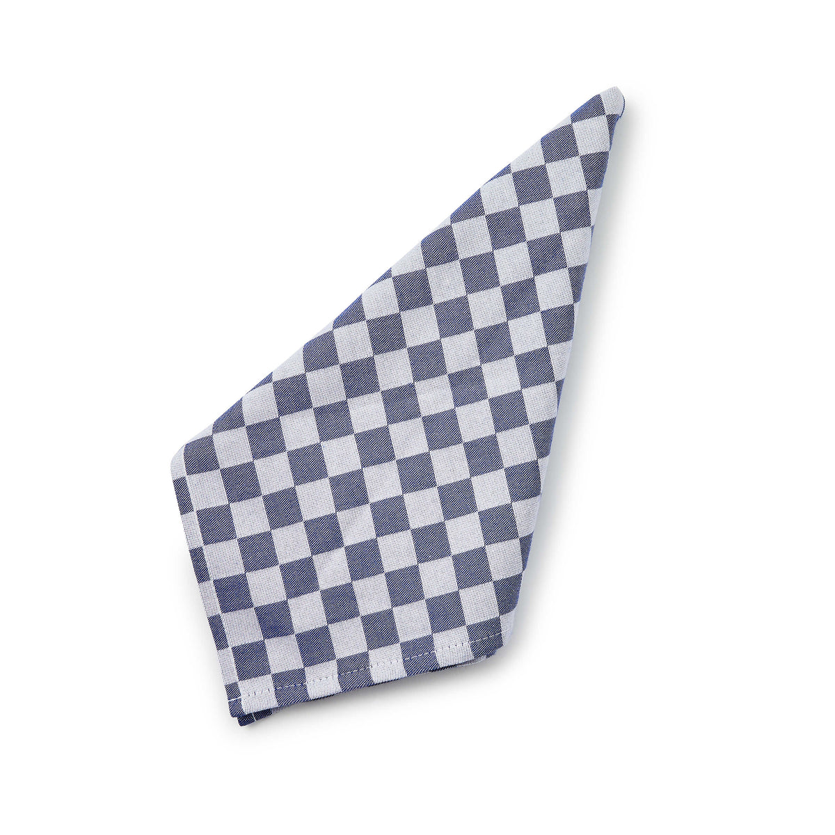 Set of four woven jacquard check napkins in natural cotton with a classic plaid pattern.