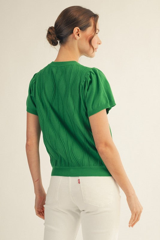 Miranda Wave lightweight sweater top in beige viscose with a subtle wave pattern.