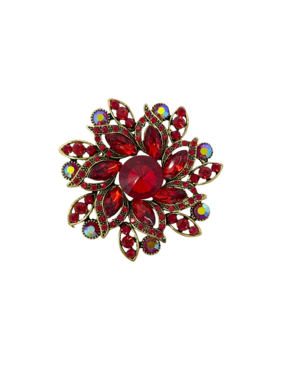 Small flower brooch with red stones and iridescent accents in an antique gold-tone setting.