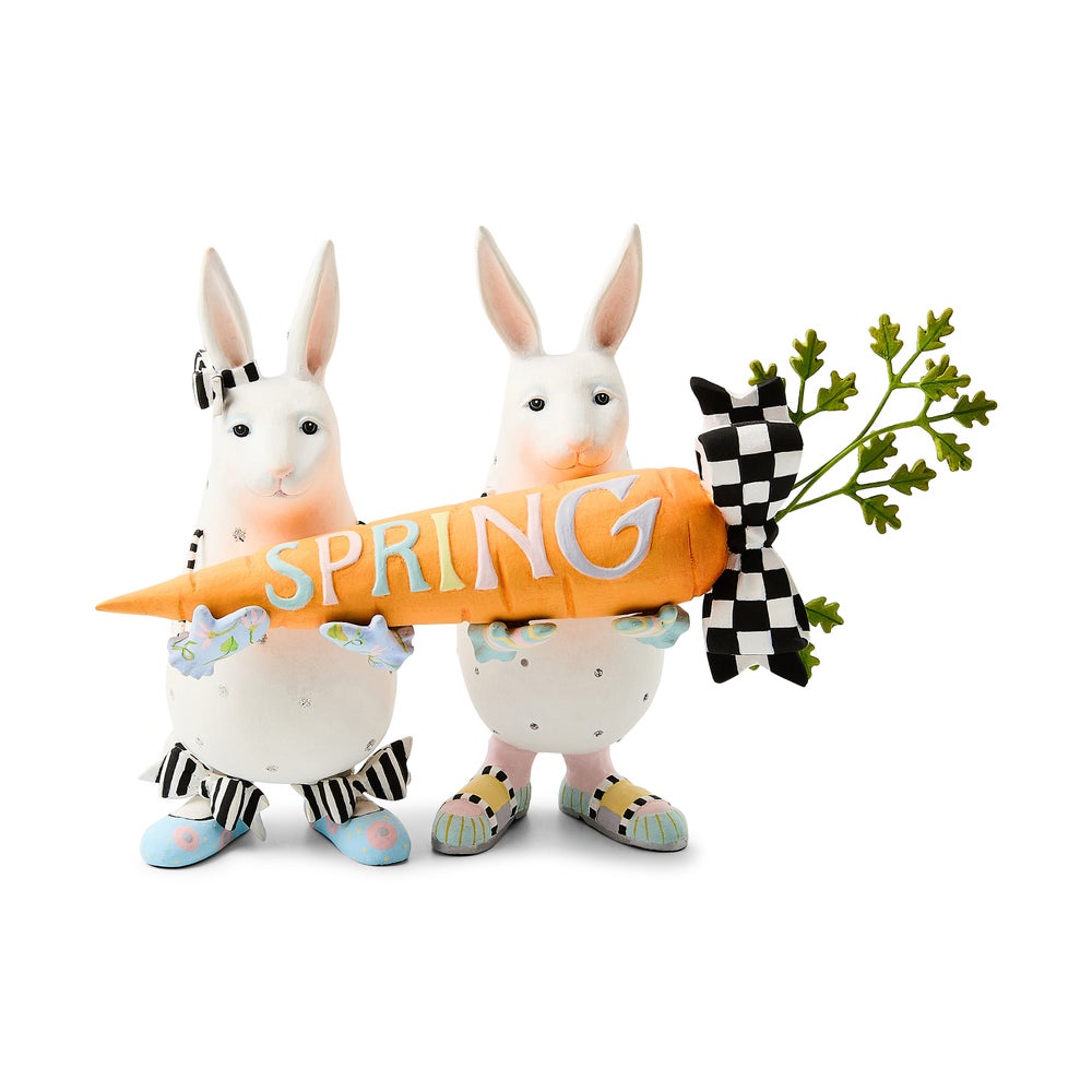 Resin figurine of Patience Brewster Spring Rabbits with pastel colors and whimsical rabbit silhouettes.