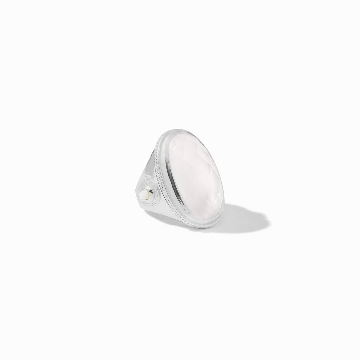 Silver plate ring with imported glass stone and shell pearl accent in a statement silhouette.