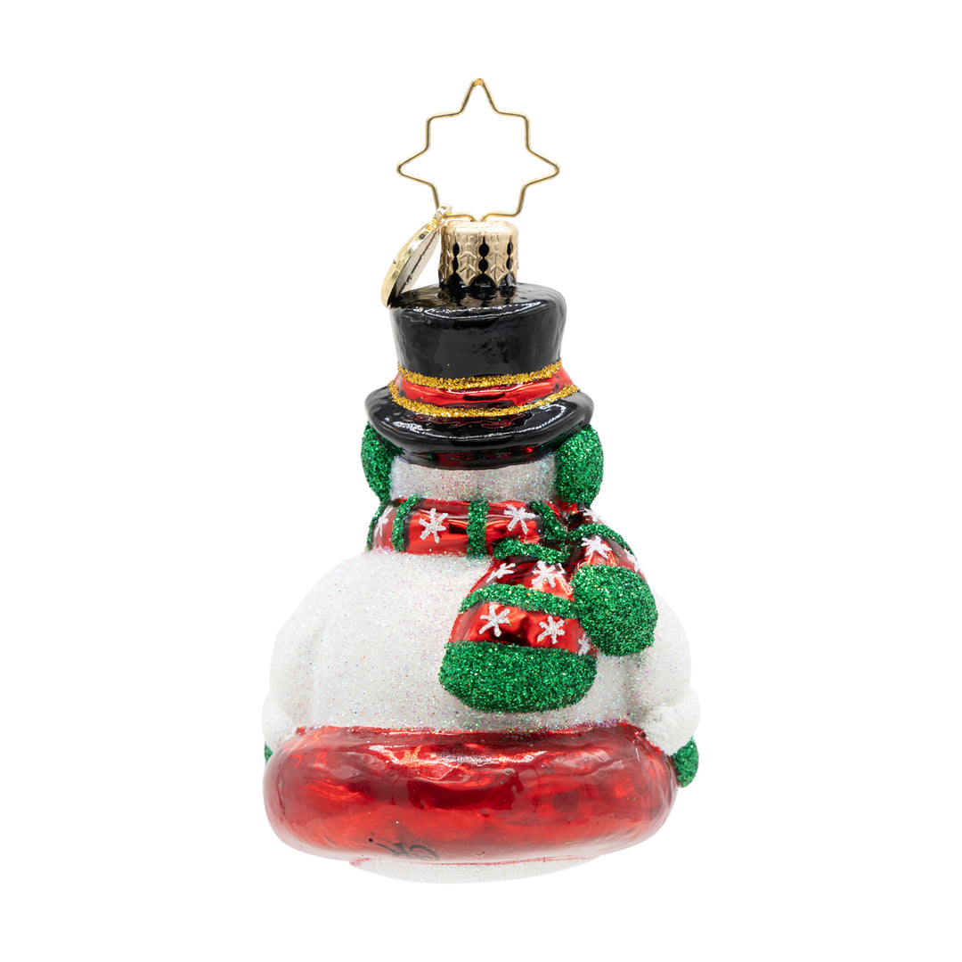 Snowman Christmas ornament wearing a black top hat and red scarf, sitting in a red inner tube.