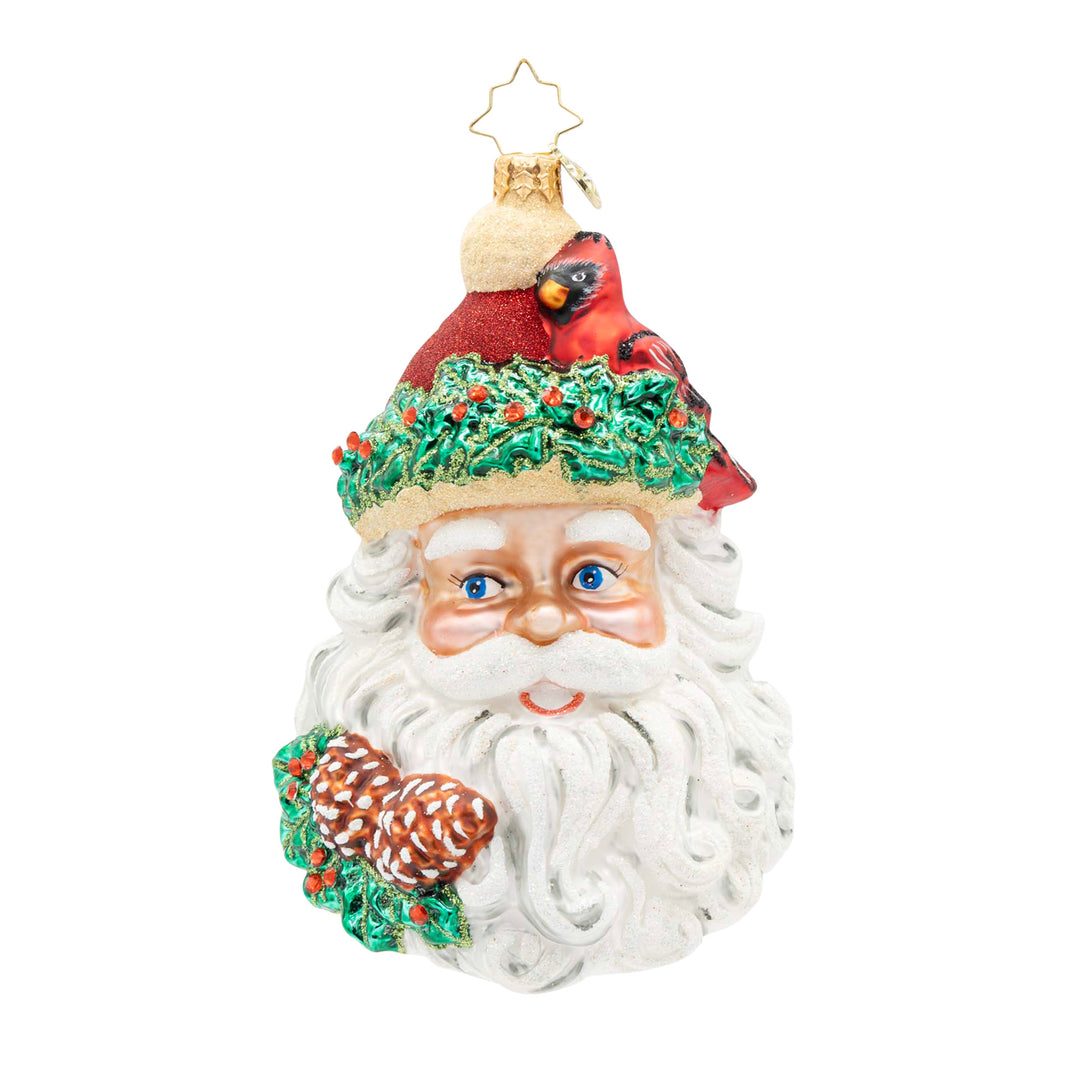 Woodland Wishes Santa glass ornament featuring a red cardinal on his hat and pinecone accents.