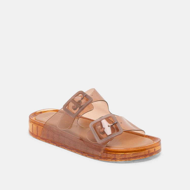 Julio Sandals in translucent brown with double buckle straps and a platform sole.