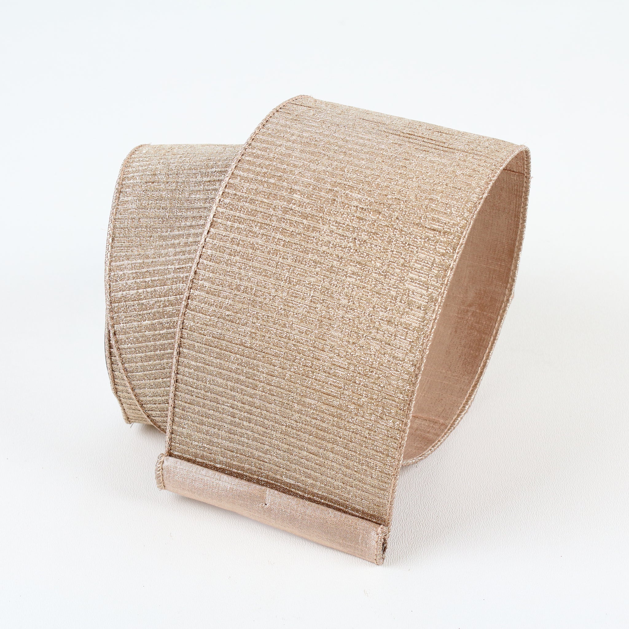 Roll of 4-inch wide pleated metallic ribbon in a shimmering platinum color.