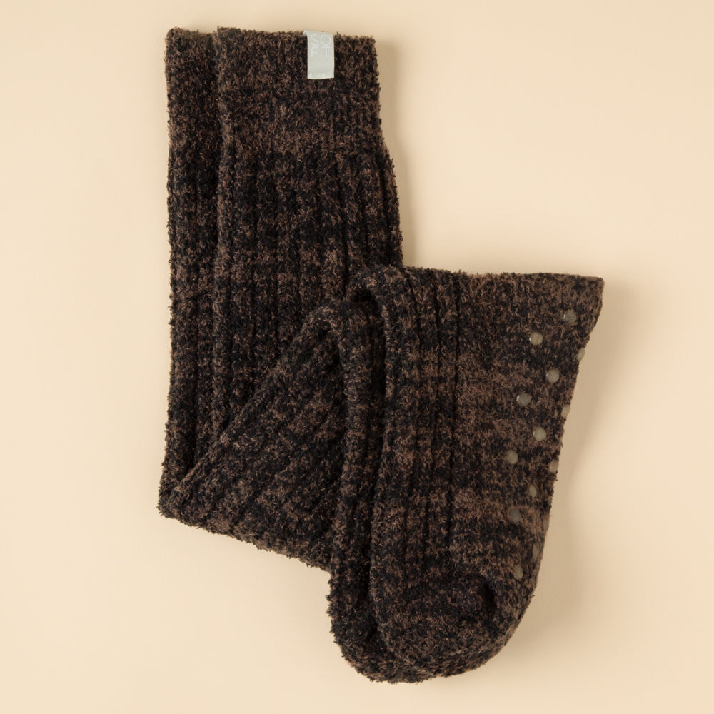 Slouchy marshmallow socks in heathered gray with non-slip grippers on the sole.