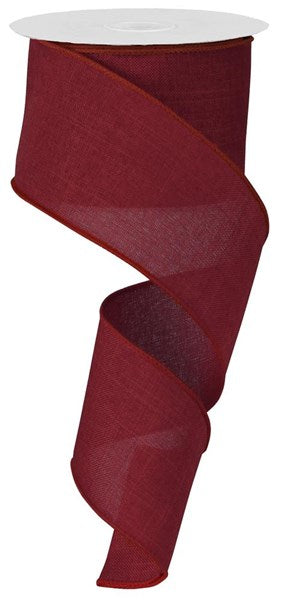A spool of royal blue burlap-style ribbon made from polyester.