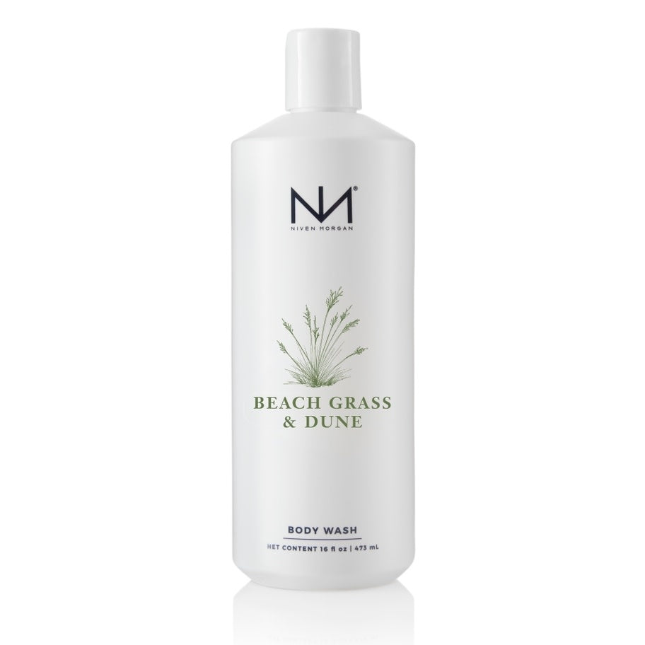 Bottle of Beach Grass & Dune body wash with a light green liquid visible through clear packaging.
