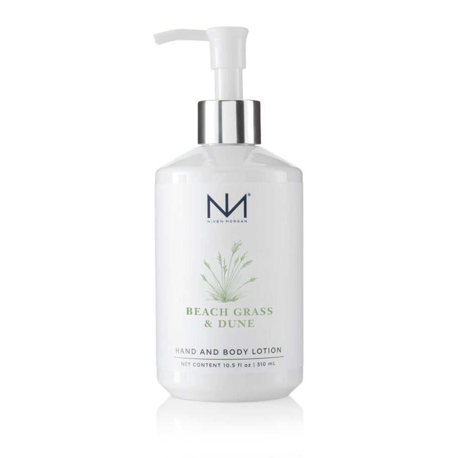 Bottle of Beach Grass & Dune hand and body lotion with a clear glass silhouette.