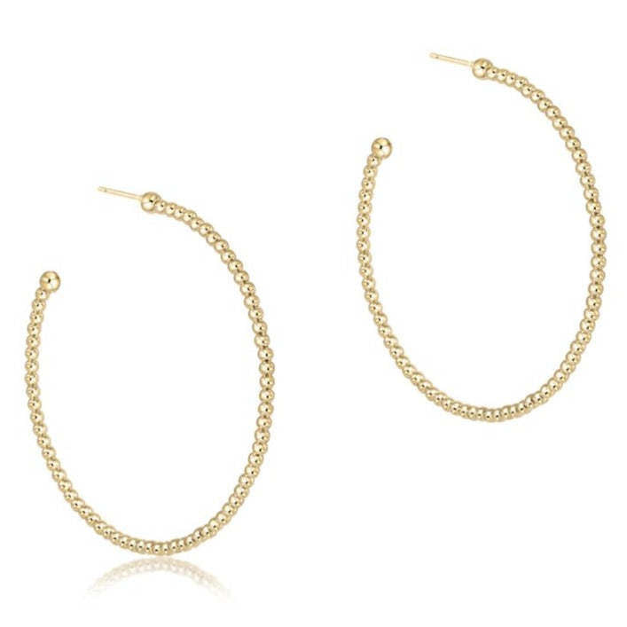 Gold-filled beaded classic post hoop earring with a small circular silhouette