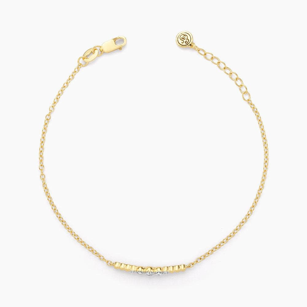 Silver beaded chain bracelet with small diamond accents on a lobster clasp closure.