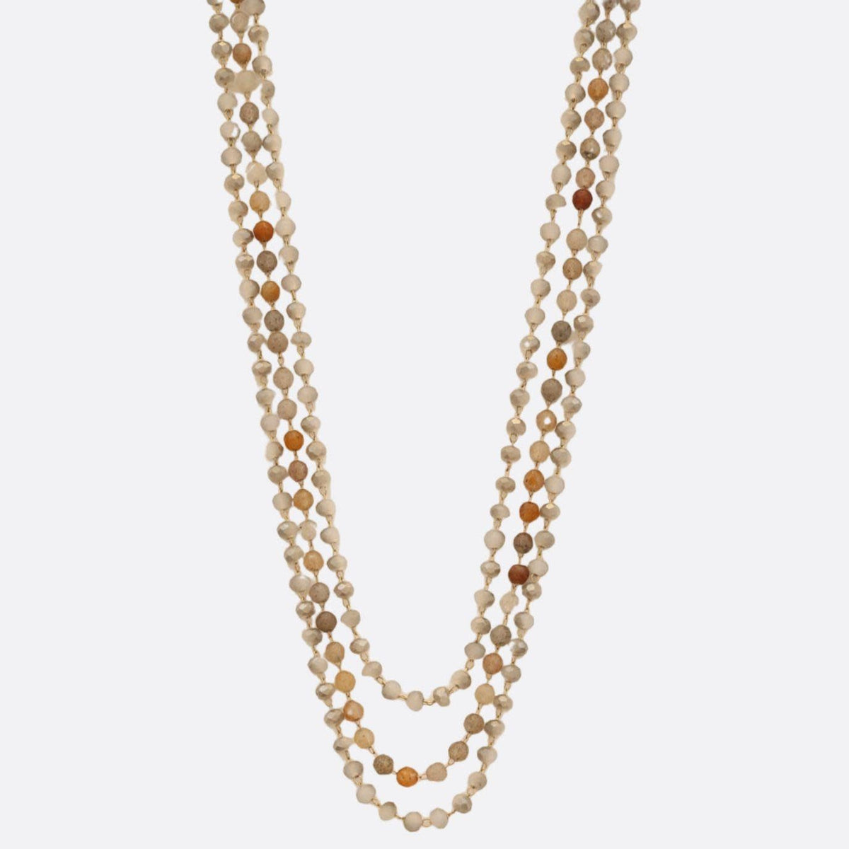 Beaded layered necklace with multiple strands of vibrant beads on a silver chain.