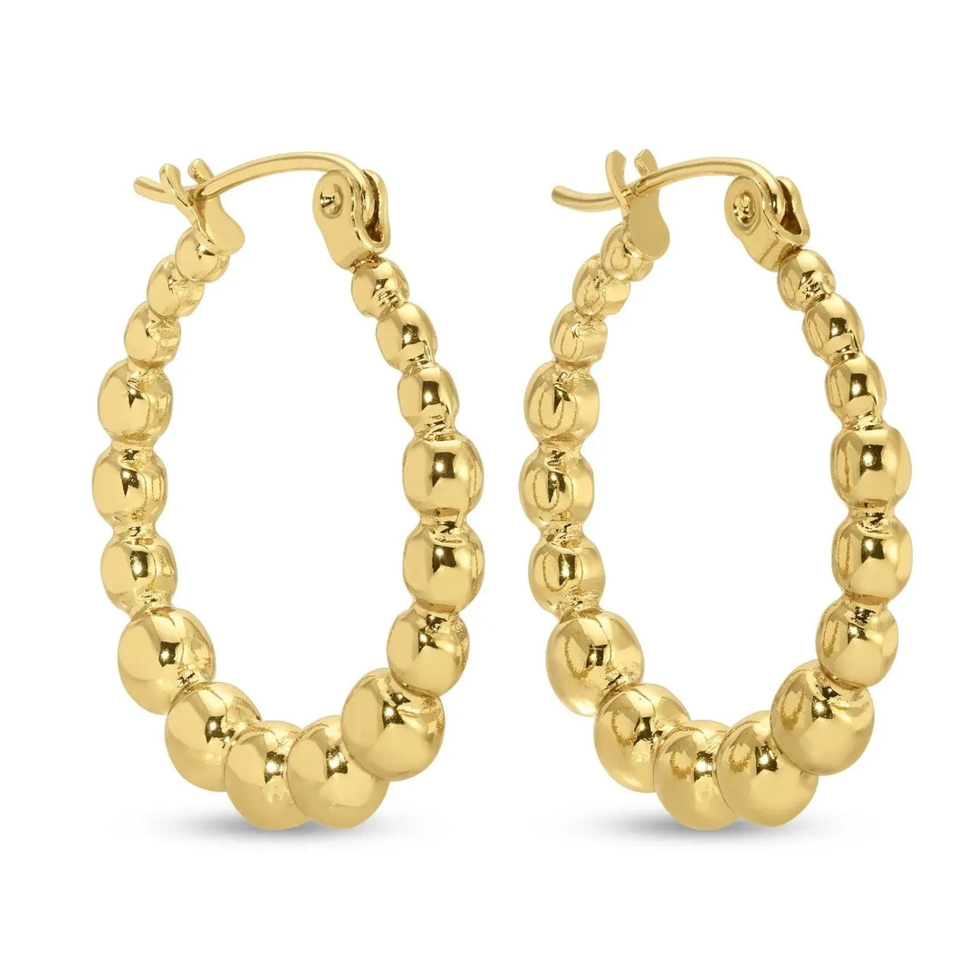 Lightweight latchback hoop earrings with a delicate beaded design on an 18k gold plated brass base.