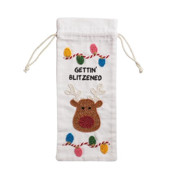 Beaded wine bag with a cotton exterior featuring intricate beadwork in neutral tones.