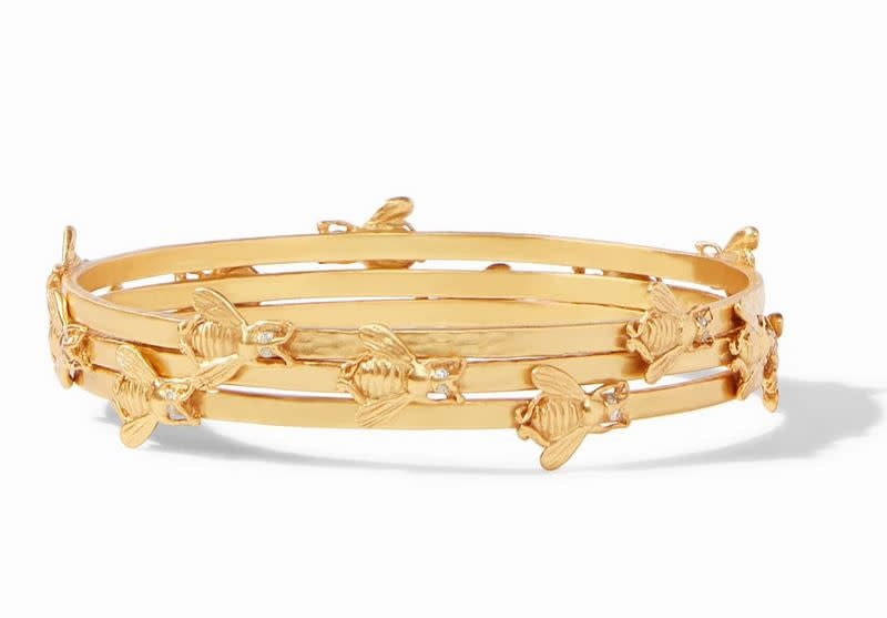 Medium gold-plated bangle with hammered texture featuring whimsical bee stations accented by sparkling CZ eyes.