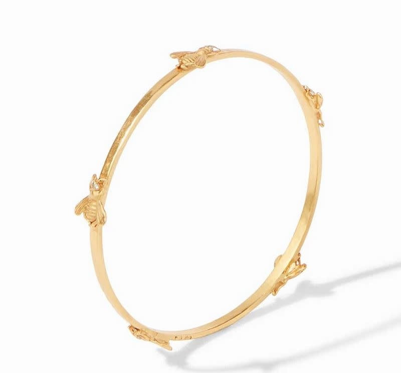 Medium gold-plated bangle with hammered texture featuring whimsical bee stations accented by sparkling CZ eyes.