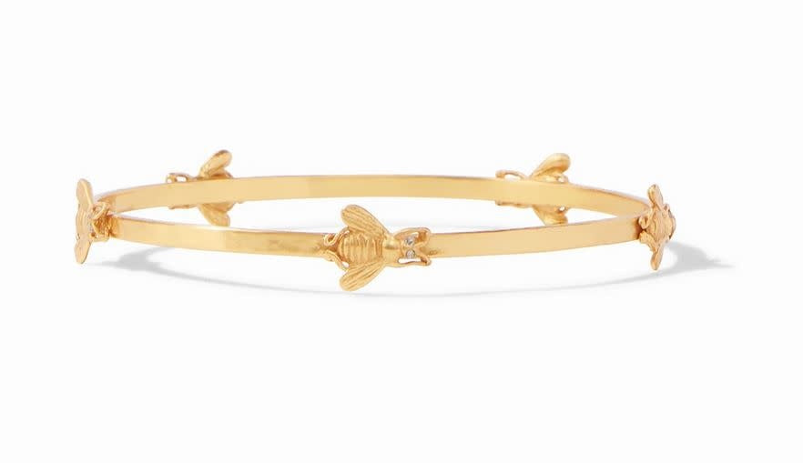 Medium gold-plated bangle with hammered texture featuring whimsical bee stations accented by sparkling CZ eyes.