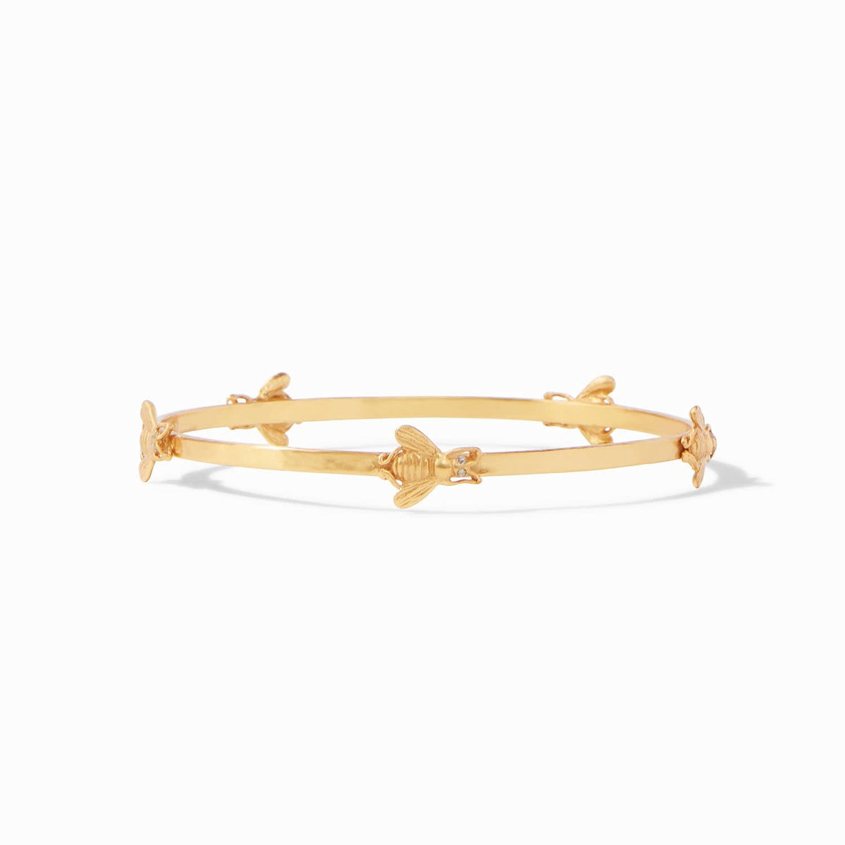 Medium gold-plated bangle with hammered texture featuring whimsical bee stations accented by sparkling CZ eyes.