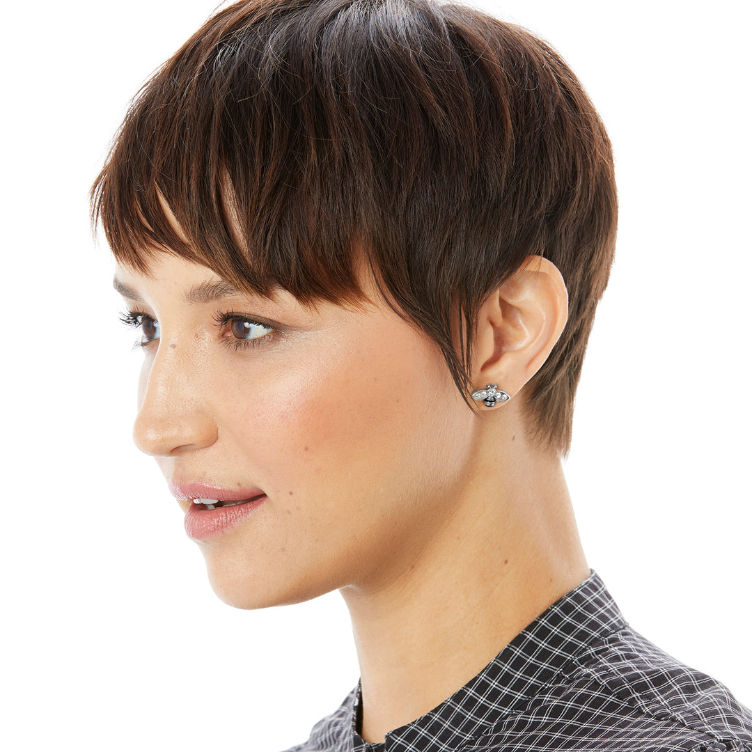 Silver plated mini post earrings featuring a bee-shaped crystal drop with garden-inspired silhouette.