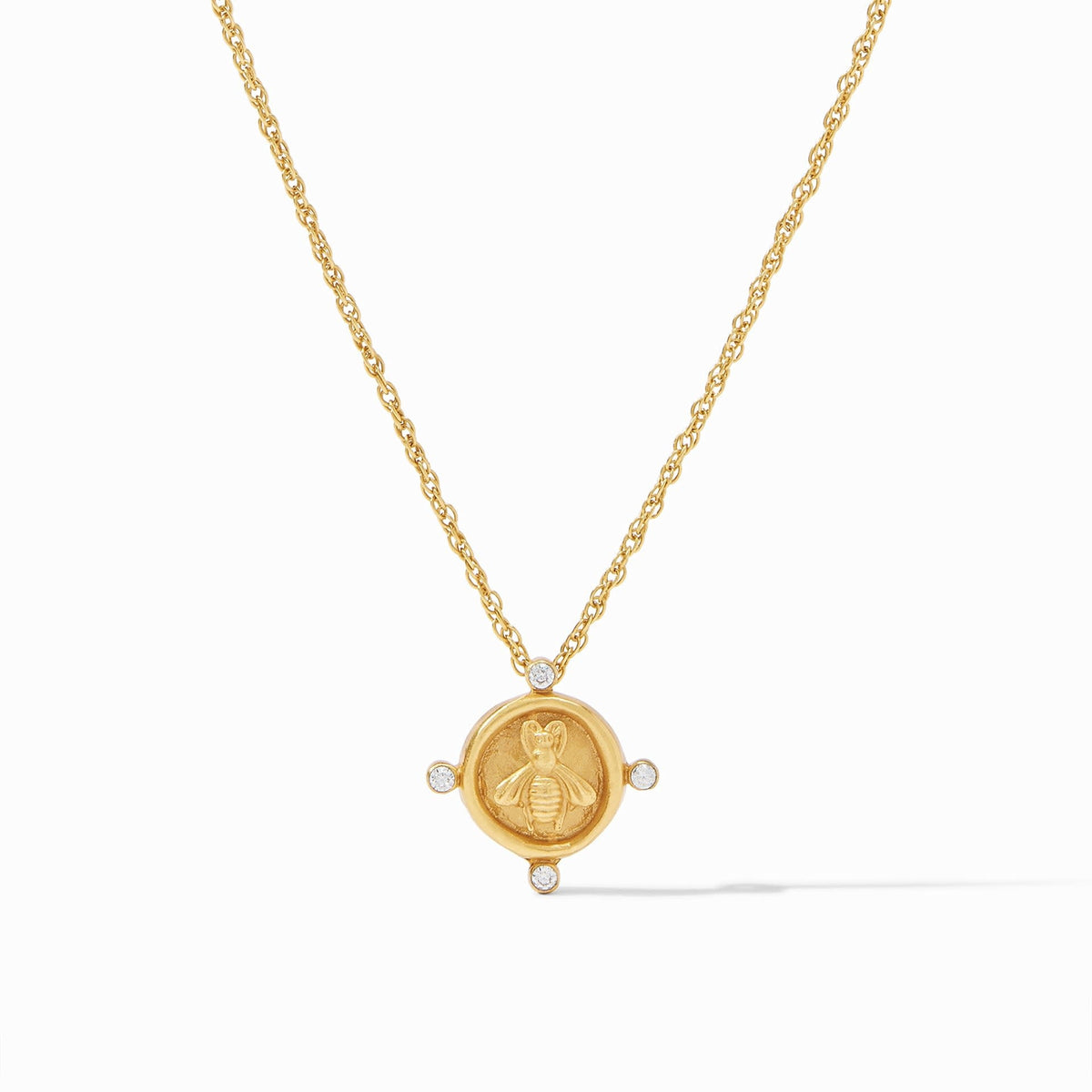 Delicate gold plate necklace featuring a molded bee cameo surrounded by four cubic zirconia stones.