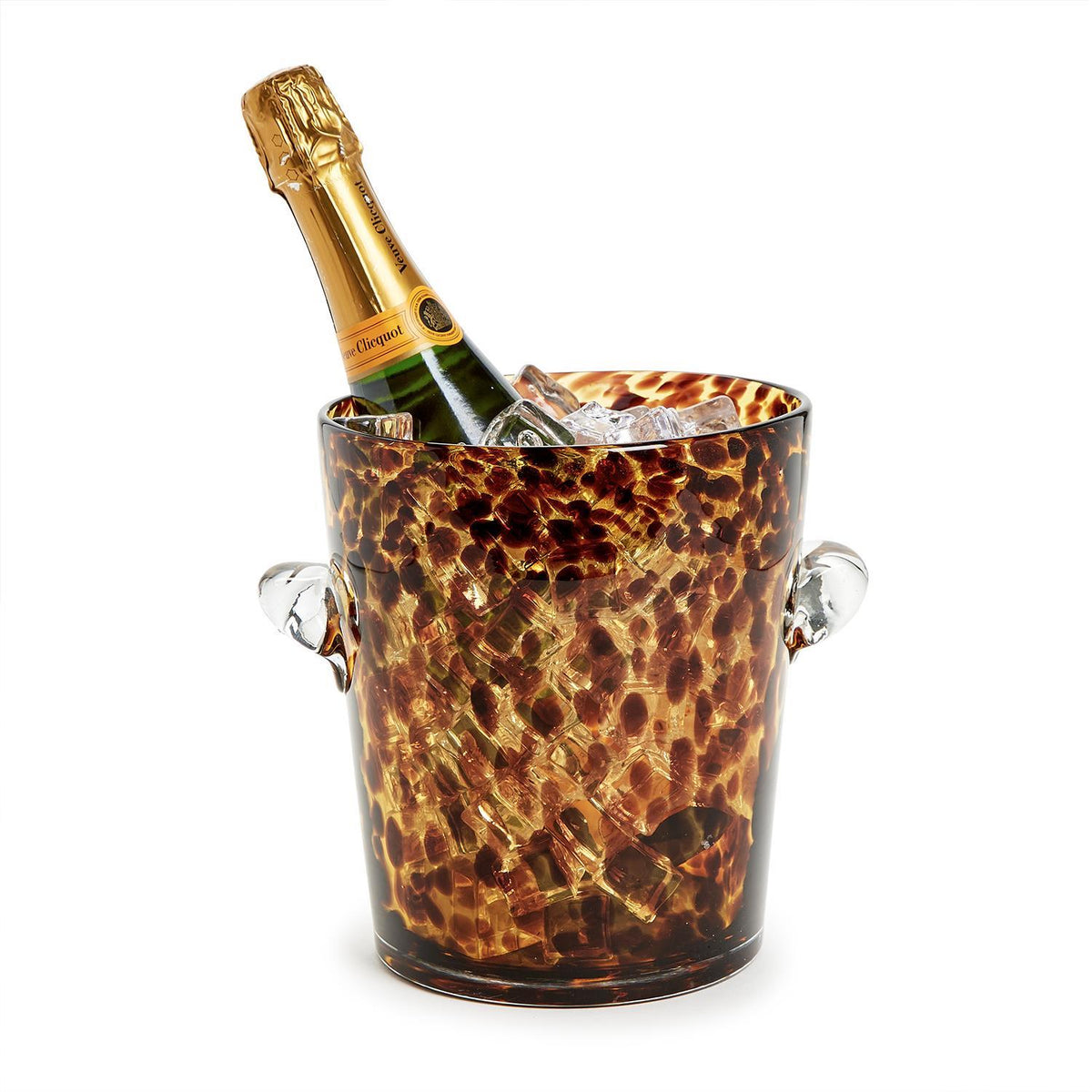 Glass tortoise print ice bucket with handles, holding a bottle of champagne and ice cubes.