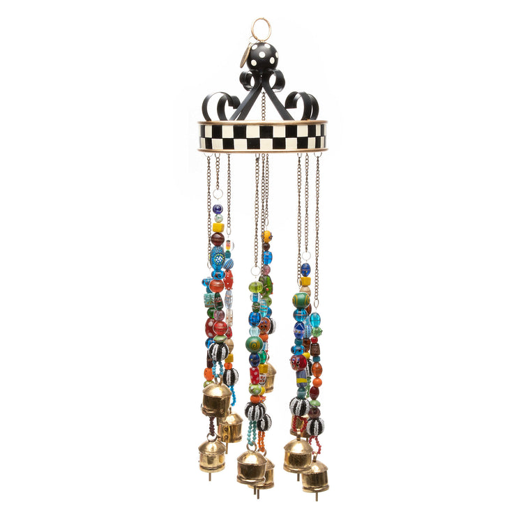 Handmade wind chimes with brass bells, glass beads, iron frame, and checked metal top.