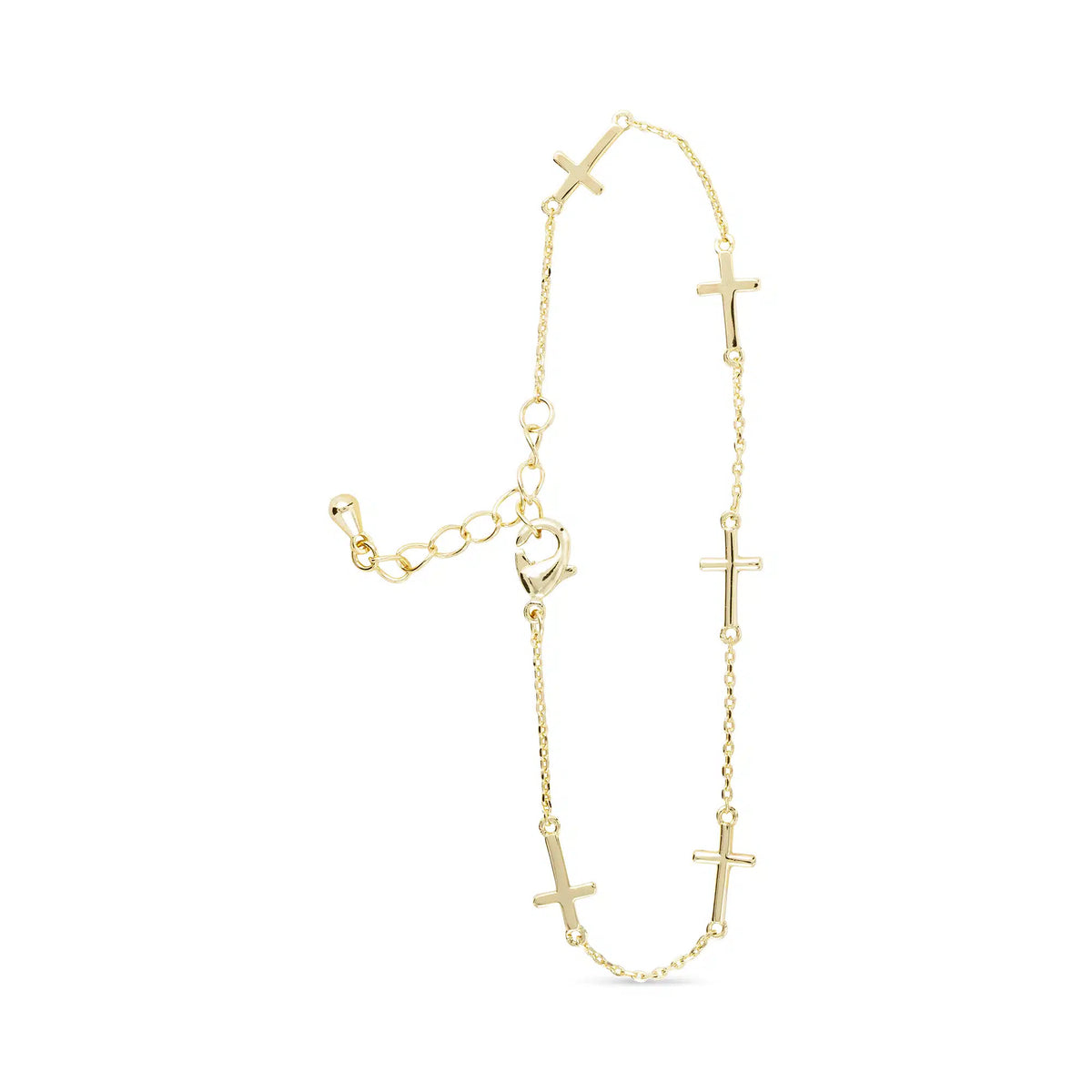 Gold station bracelet with five small cross charms on a fine chain with an adjustable clasp.
